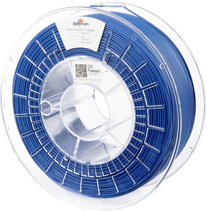 A spool of blue PET-G 3D printing filament labeled 'Spectrum PET-G Matte, Navy Blue,' with a QC passed sticker and a QR code.
