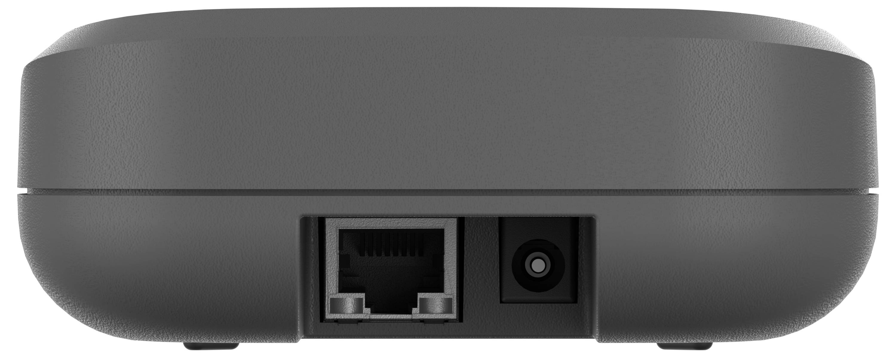 A close-up of the back of a small, black electronic device, showing an Ethernet port and a power connector.