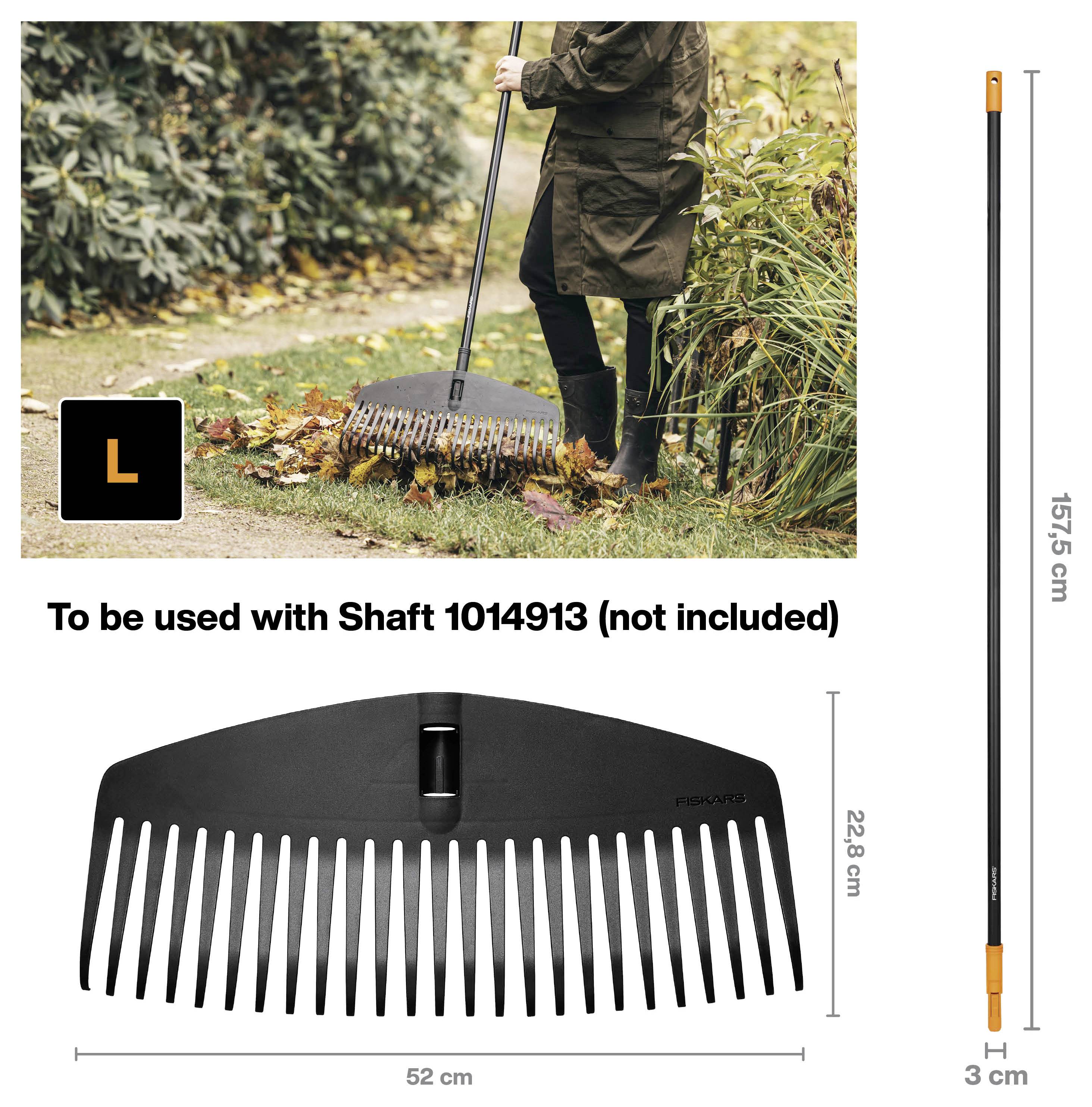 A person rakes autumn leaves using a large black rake head on a long shaft. Text indicates shaft model 1014913 is required but not included.