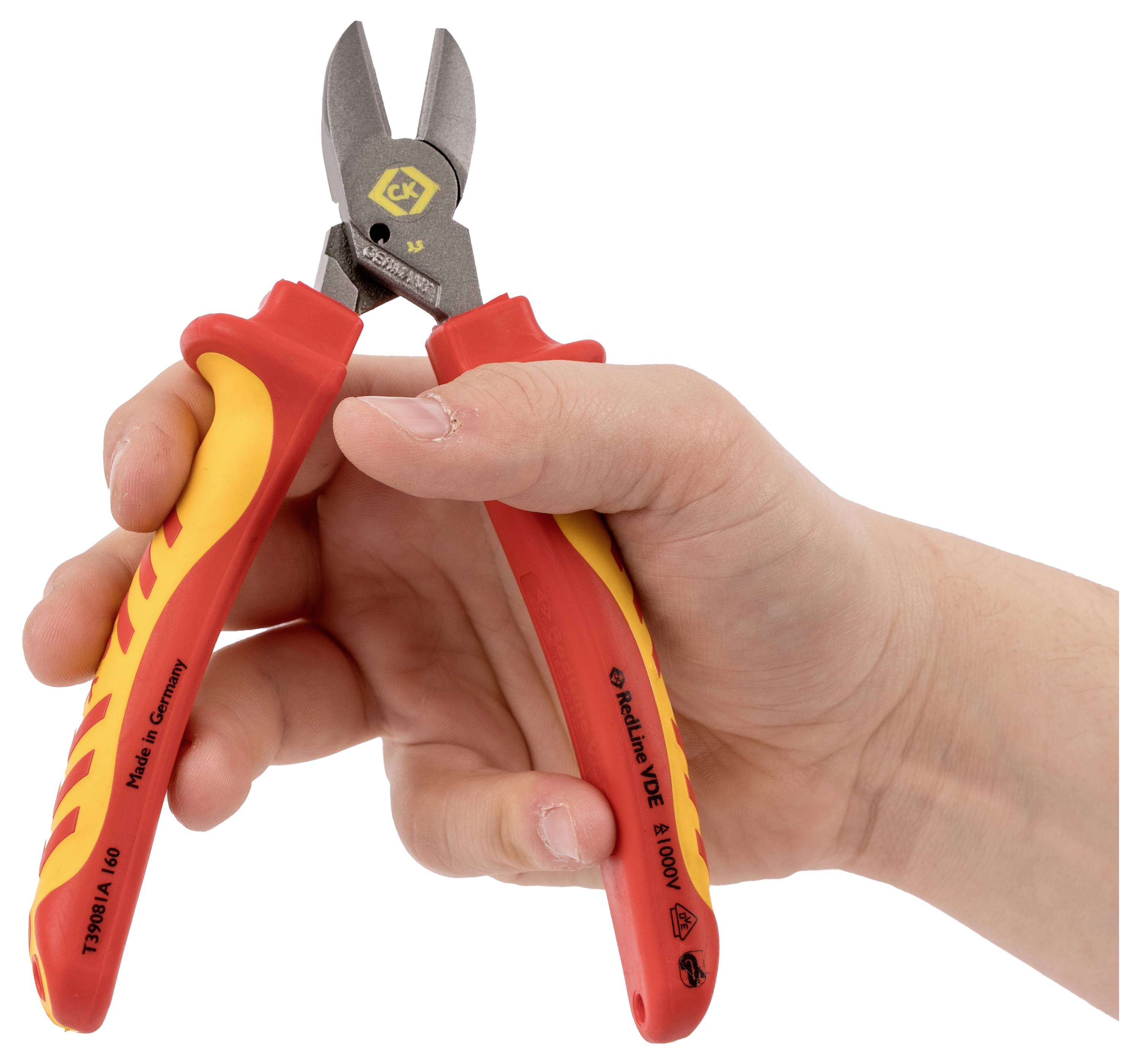 A hand holding red and yellow wire cutters, showing the cutting blades and ergonomic grip design.