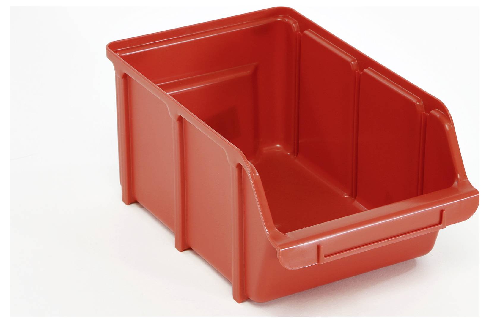 A red plastic storage bin, rectangular with an open front, used for organizing and storing various items.