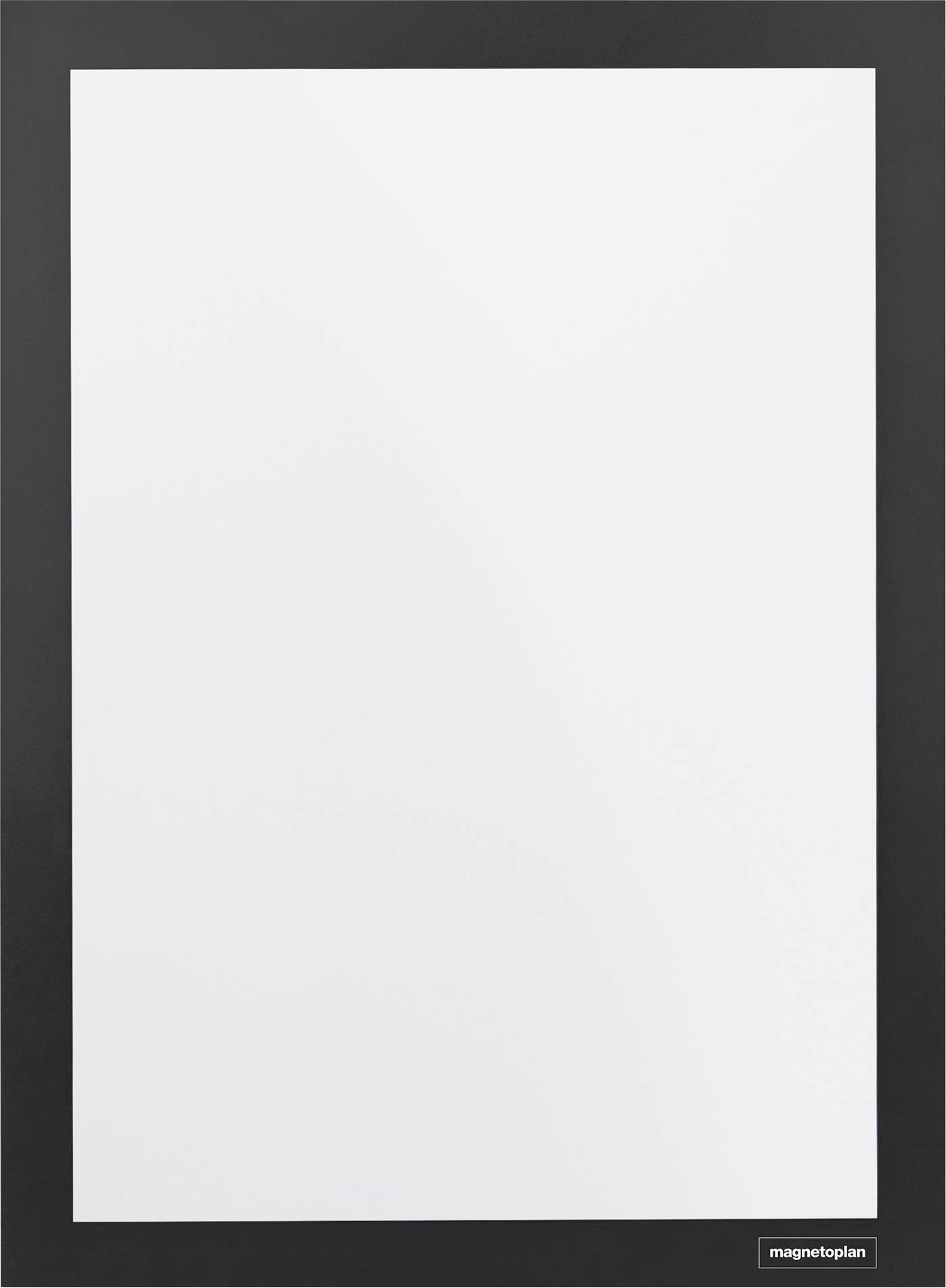 An empty whiteboard with a thin black frame standing upright, suitable for writing or drawing, located indoors.