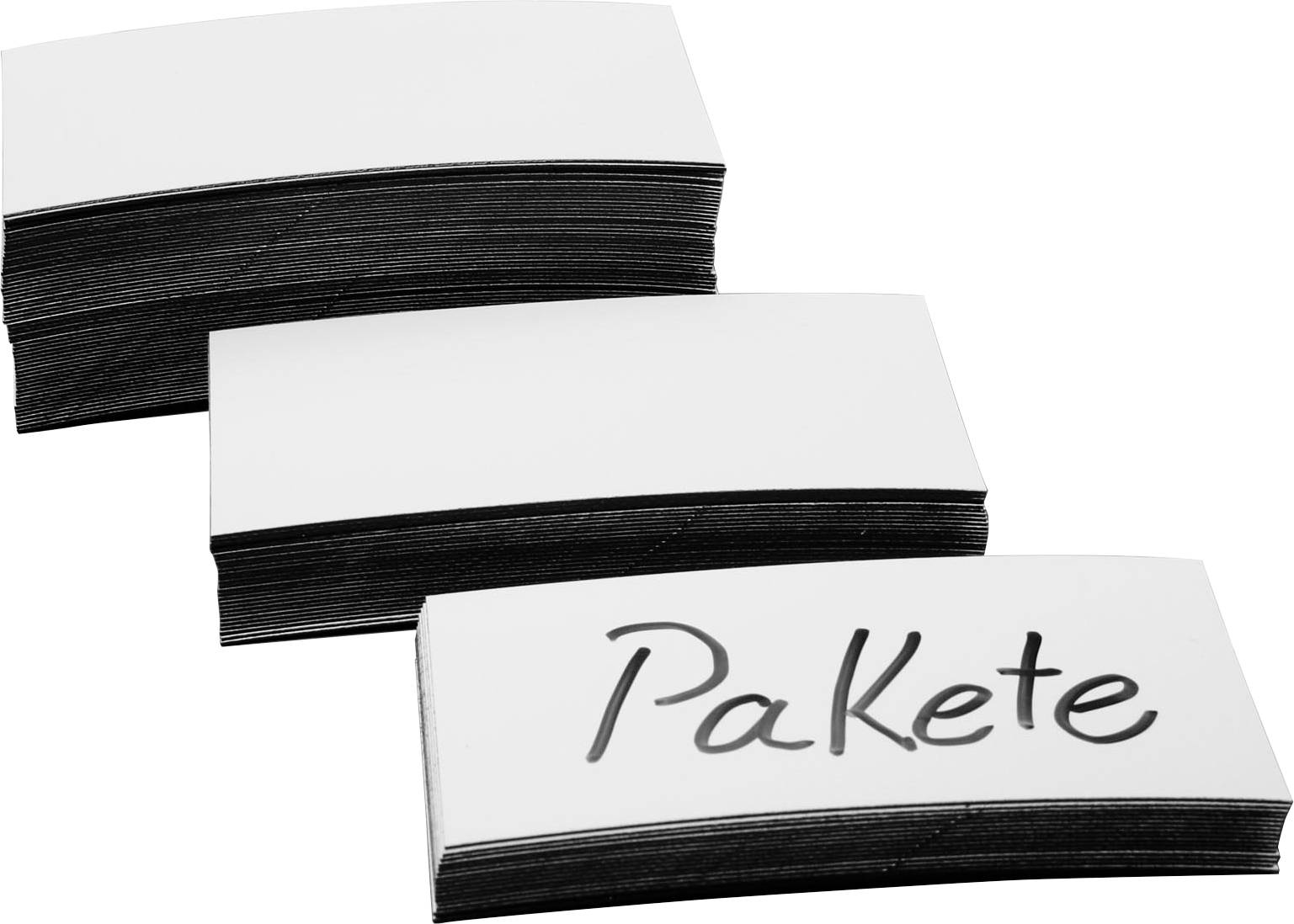 Three stacks of blank cards, with the front card on the right labeled 'PaKeTe' in large, handwritten letters.