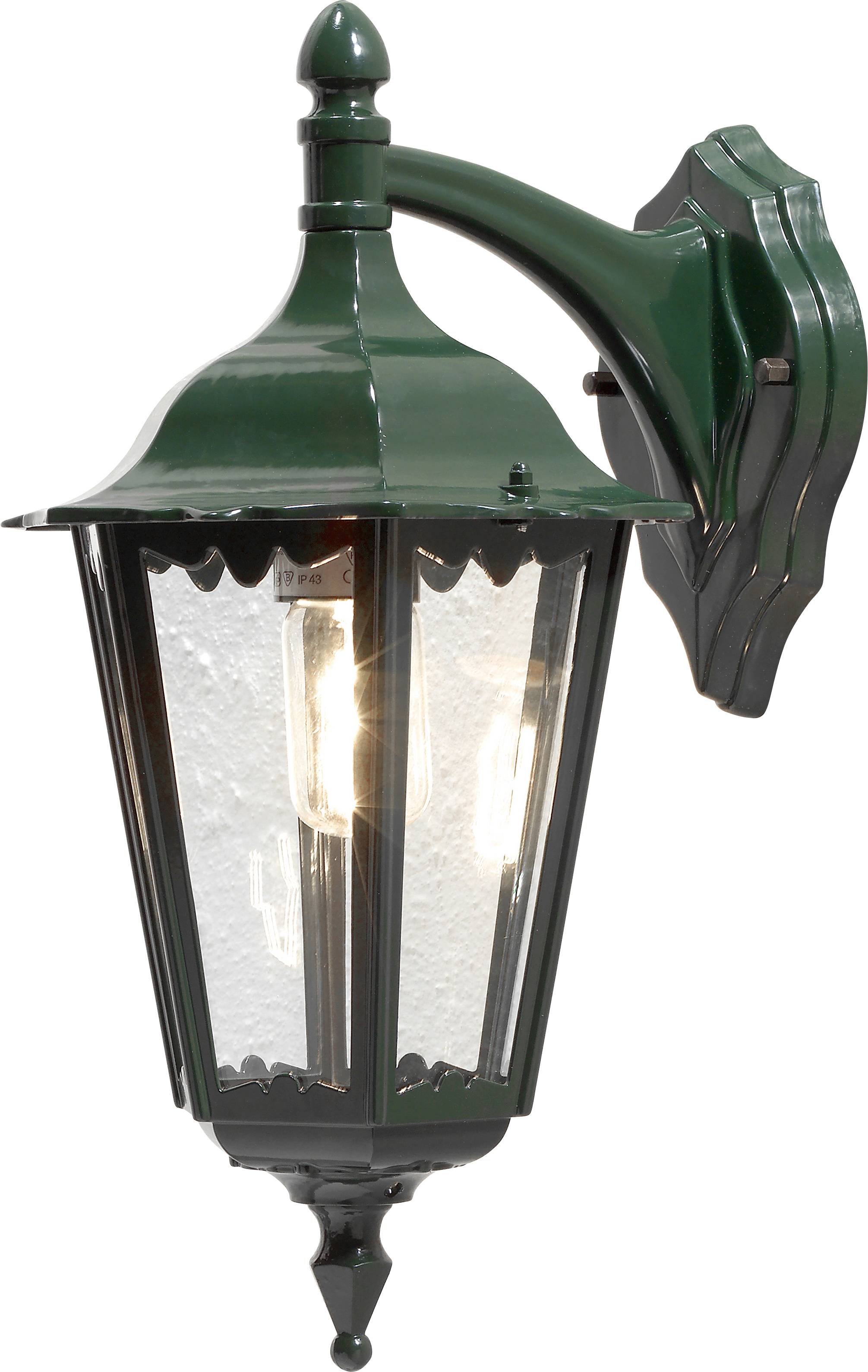 An outdoor wall-mounted lantern with a green metal frame and clear glass panes, illuminating from a single visible light bulb inside.