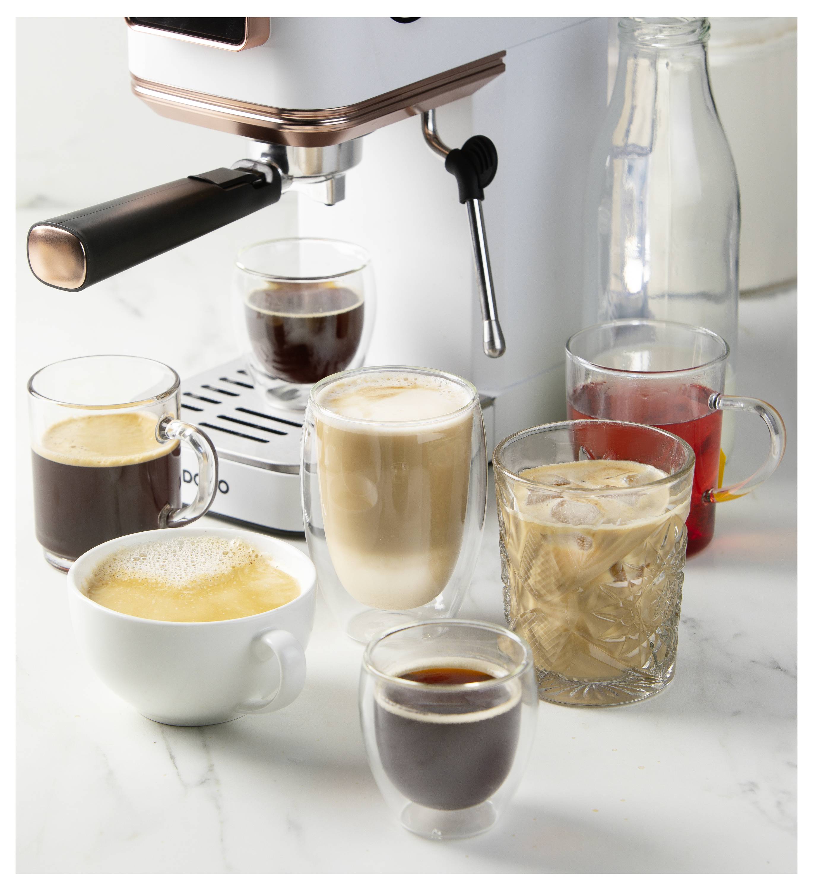 An espresso machine with various coffee beverages like espresso, cappuccino, latte, and iced coffee on a marble counter.