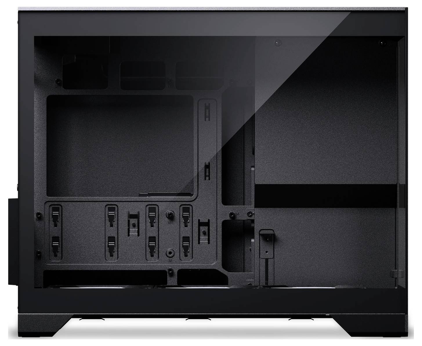 A black computer case with a transparent side panel, showing multiple slots and mounts for internal components. The interior is empty.