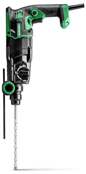 A green and black rotary hammer drill with a metal drill bit attached, shown vertically against a white background.