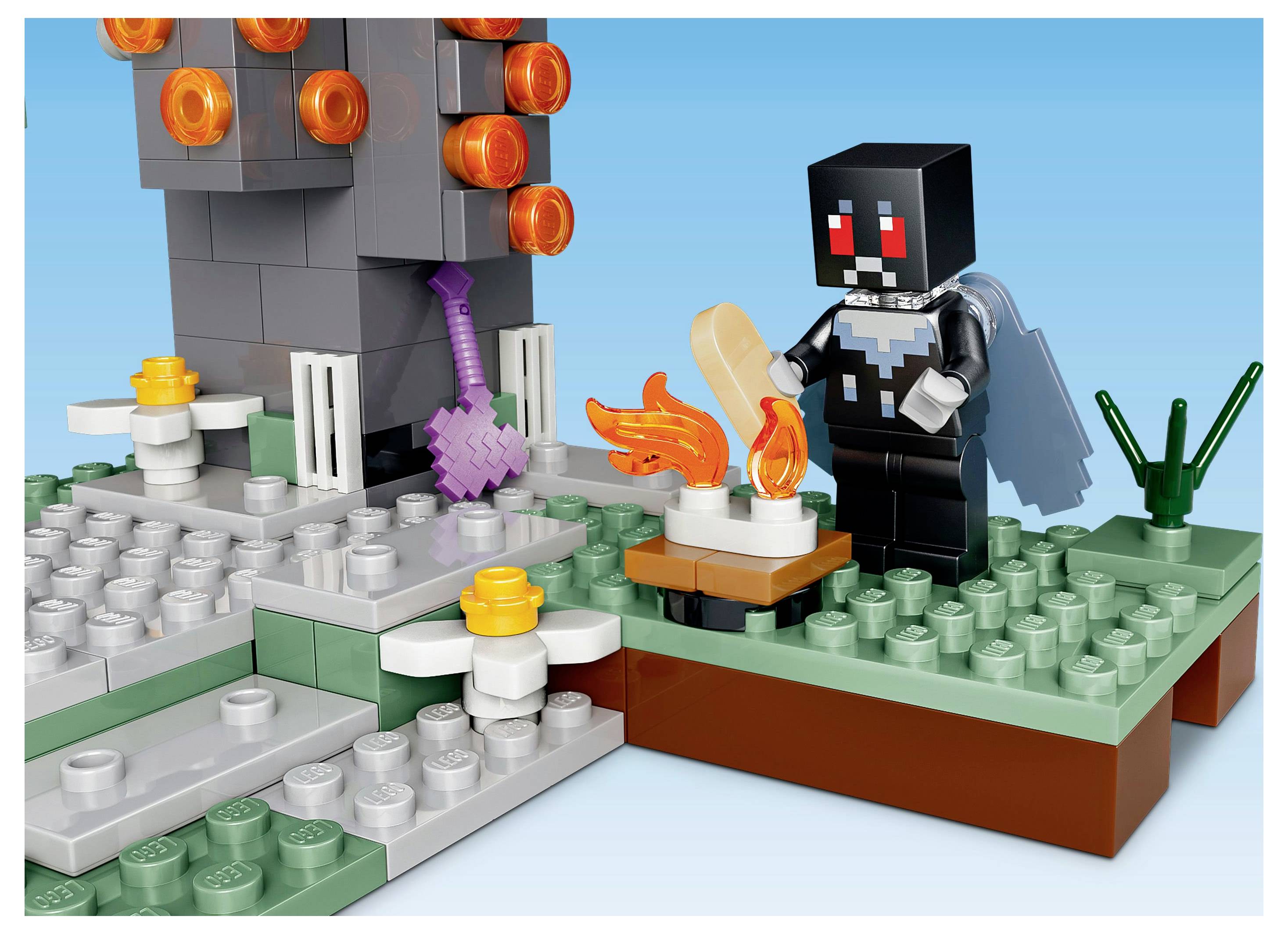 A pixelated block figure with a black square head stands near a campfire with flames, next to a purple sword embedded in stone.