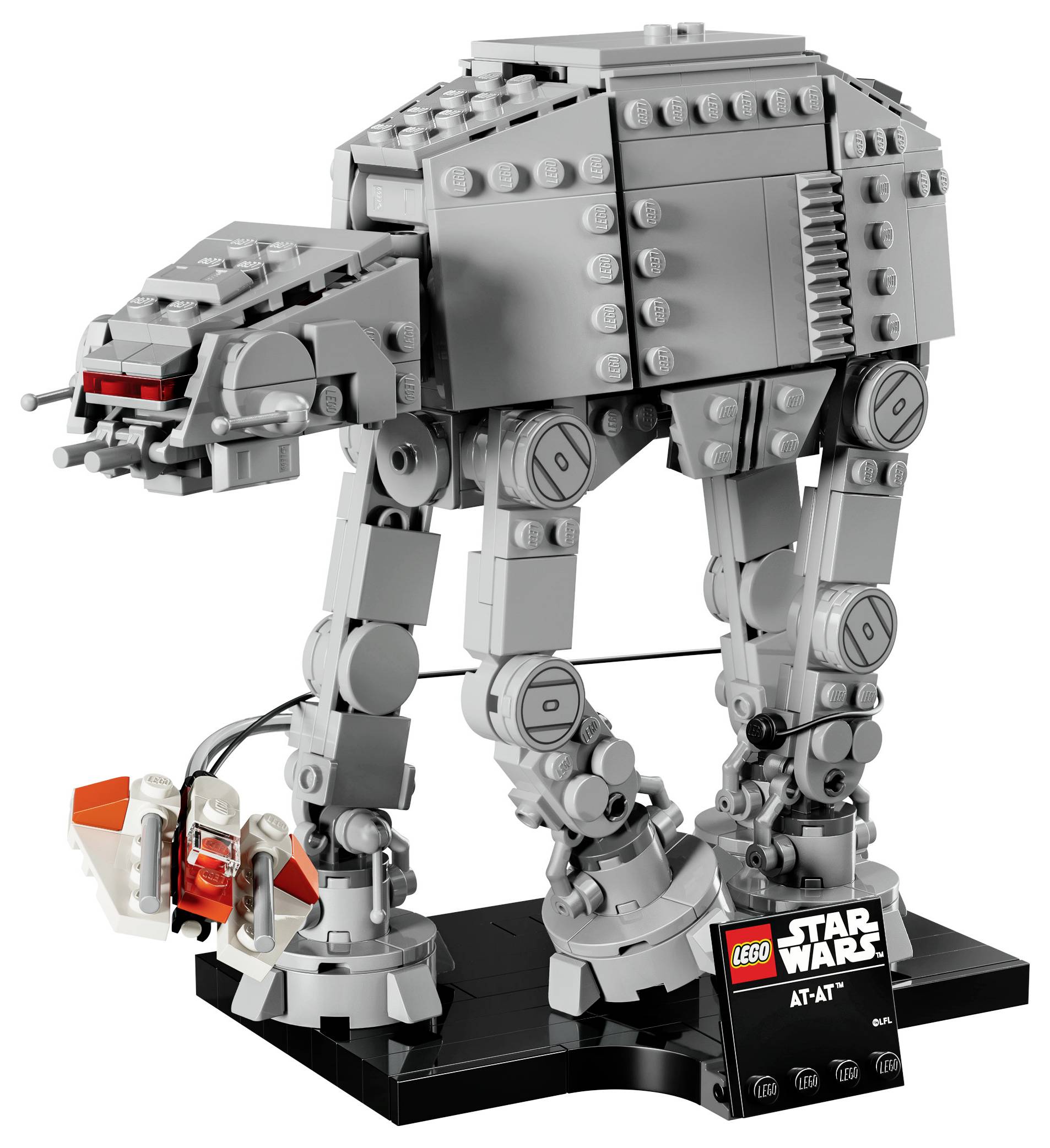 LEGO model of a Star Wars AT-AT walker on a display base, with a small plaque showing 'LEGO Star Wars AT-AT'.