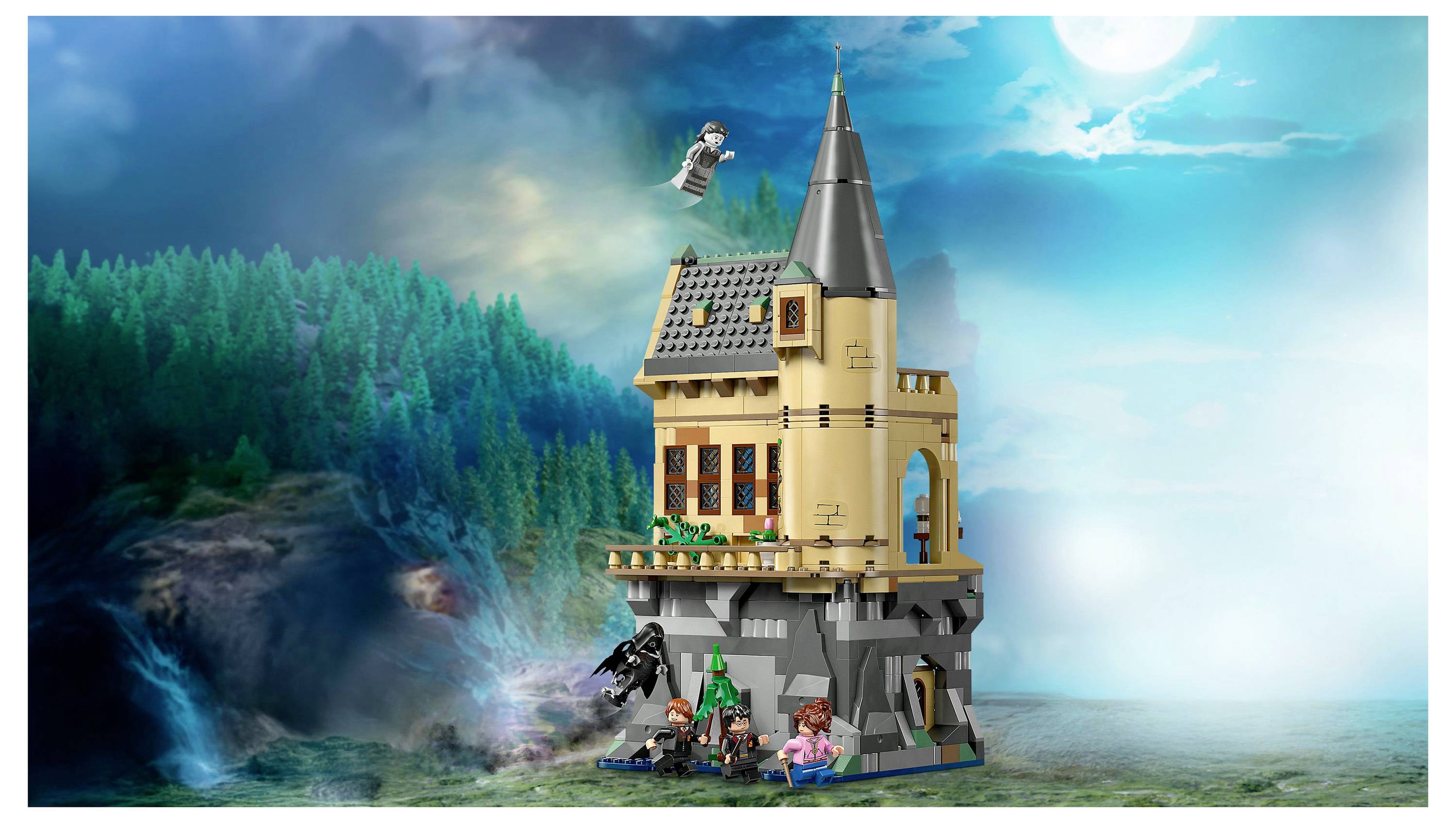 A tall, detailed LEGO tower stands with forest and moonlit sky backdrop. Minifigures are engaged in various activities around the tower.