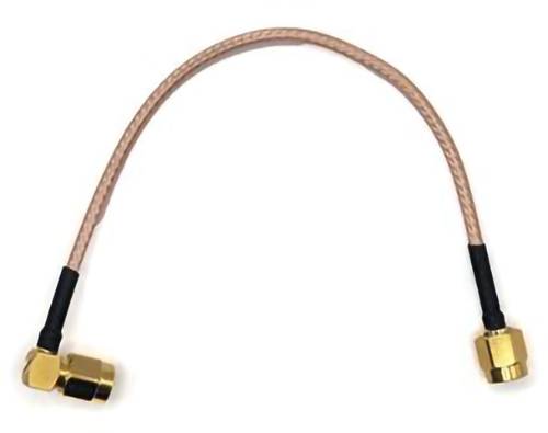 A pink coaxial cable with gold-plated connectors at each end, slightly bent in an arc shape, used for electrical or signal connections.