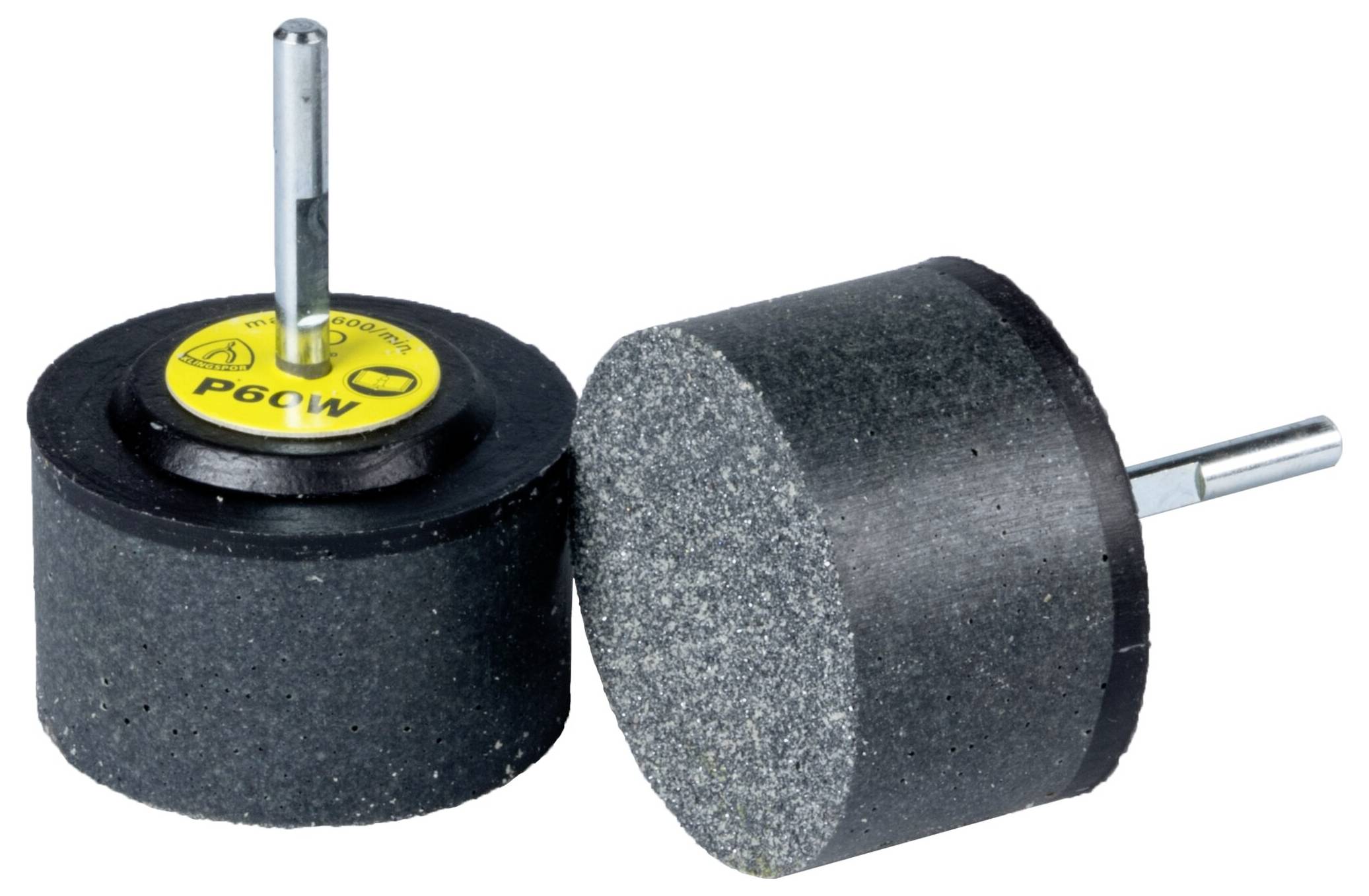 Two cylindrical abrasive stones with metal shafts, labeled 'P60W' on top. Used for grinding or polishing surfaces.