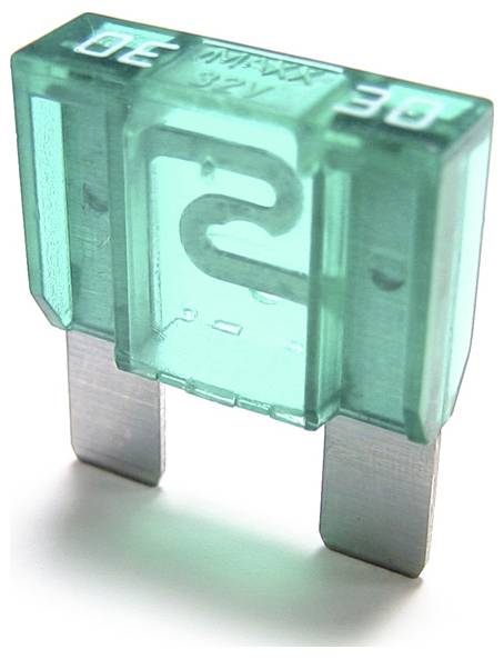A green 30-amp automotive blade fuse with two metal prongs, used for protecting electrical circuits in vehicles.