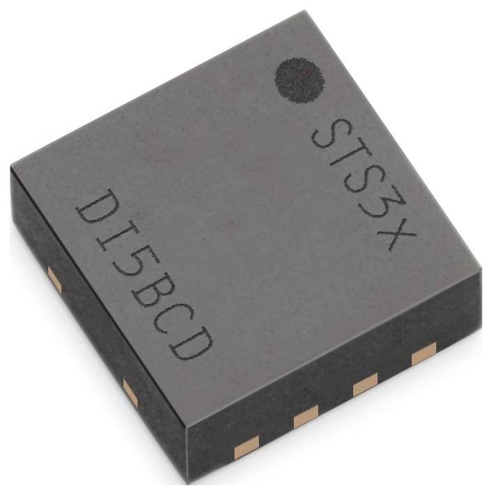 A black microchip labeled 'STS3X' and 'DI5BCD' with copper connectors on the side, likely used for electrical or technological purposes.