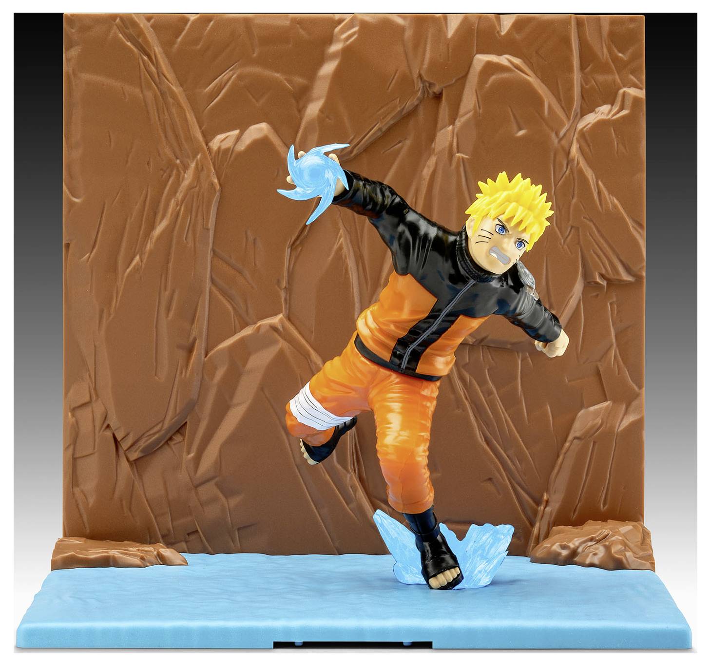 A dynamic action figure of an anime character with spiky hair, in an orange and black outfit, stands poised on a water-like base with a glowing blue energy sphere in hand against a rugged backdrop.