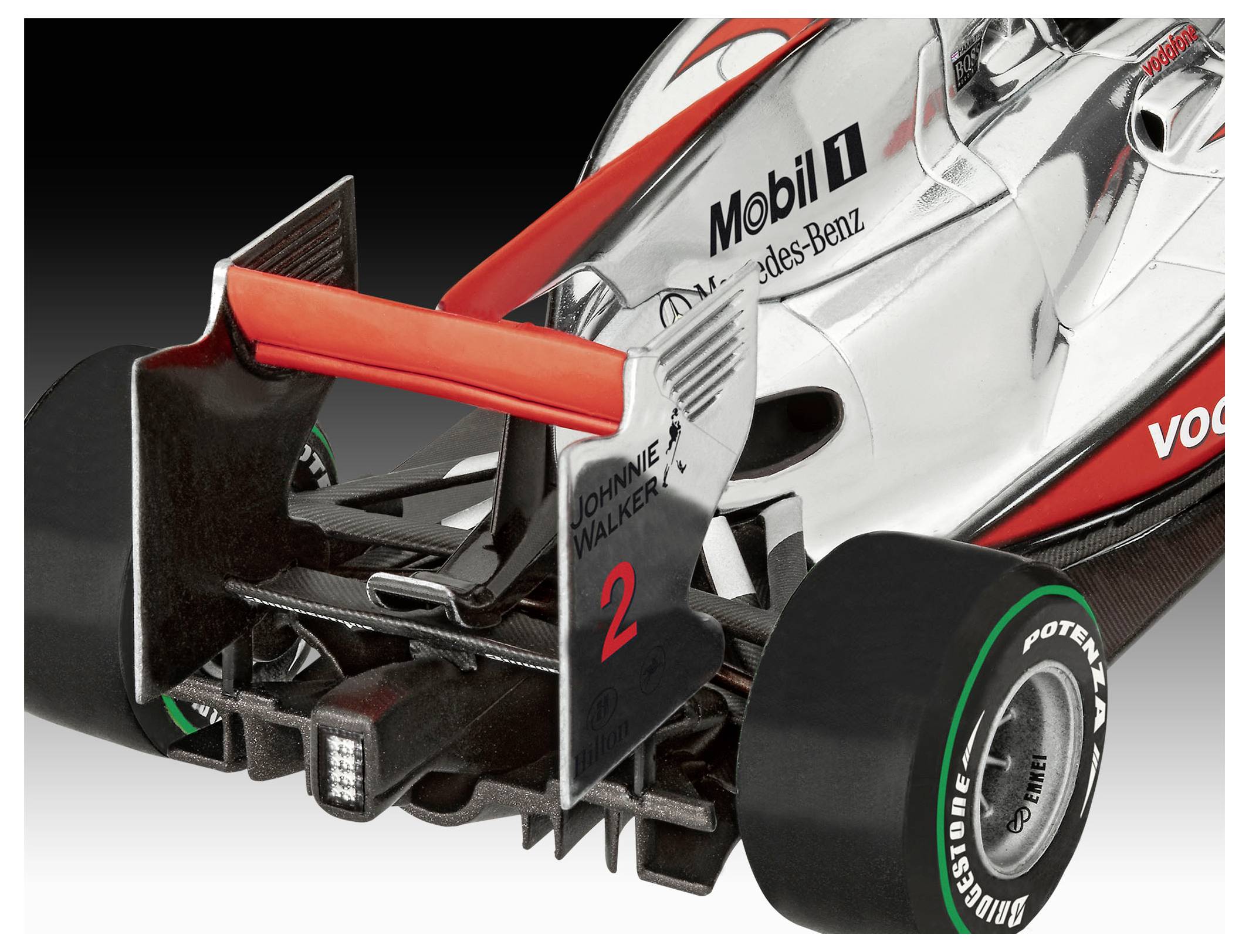 Rear view of a Formula 1 car, displaying sponsor logos like Mobil 1 and Mercedes-Benz, and features a number 2 on the rear wing.