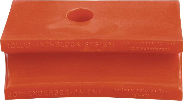 An orange block labeled 'Rothenberger Patent' and 'Rollup Anti-Block System', featuring a central hole. Used for plumbing tools.