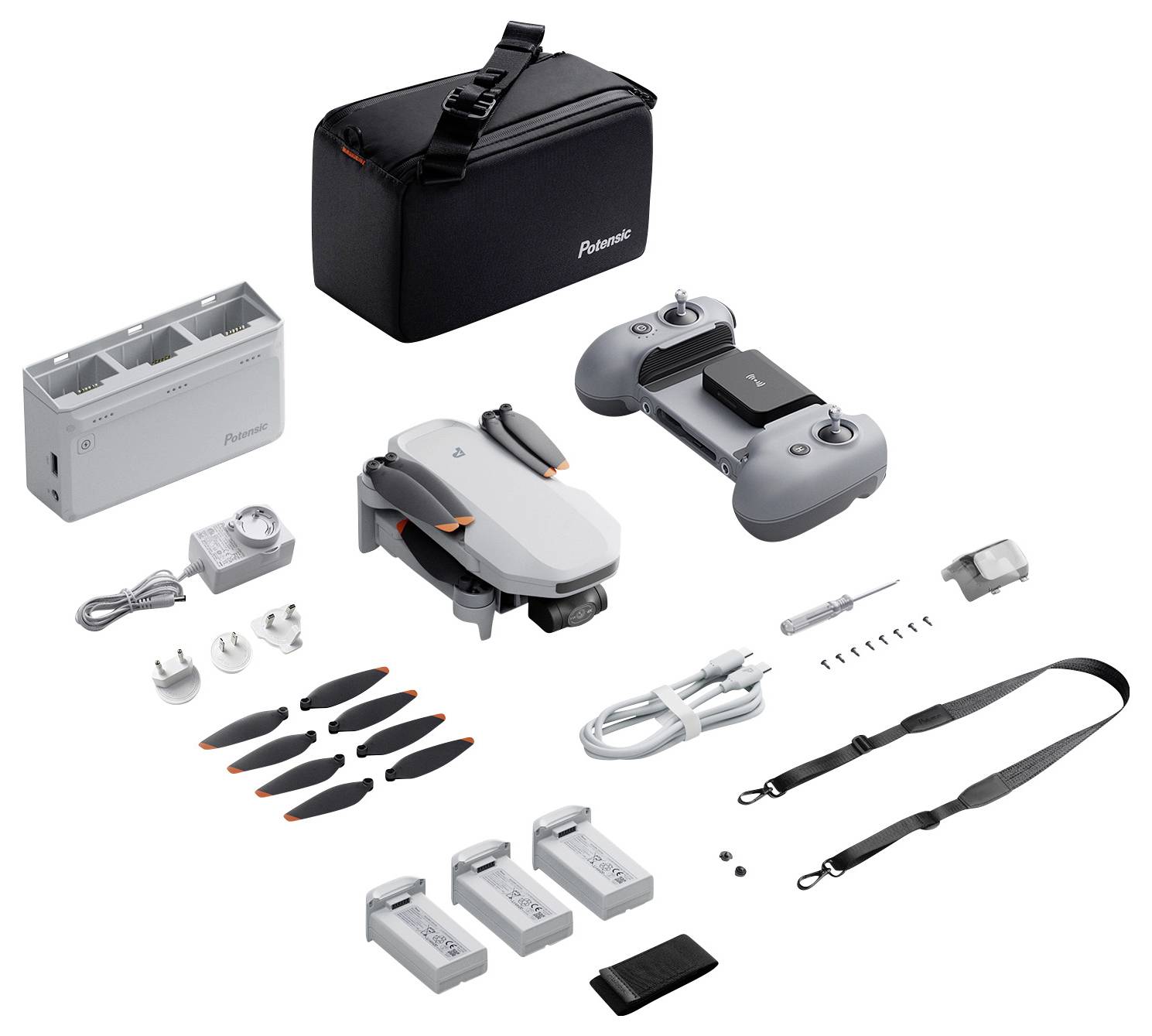 Drone kit with drone, controller, three batteries, propellers, charger, shoulder strap, screwdriver, cables, and carrying case.