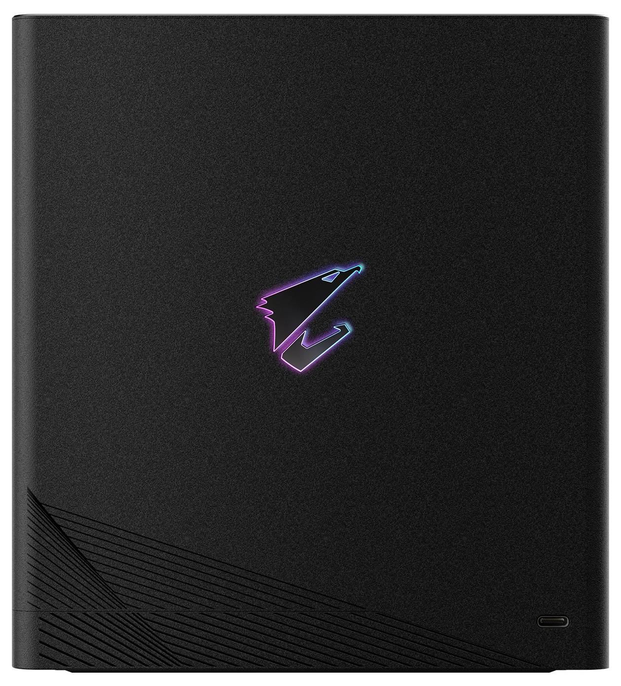 A sleek black external hard drive with a glowing logo in the center, featuring a subtle line pattern and a USB-C port at the bottom.