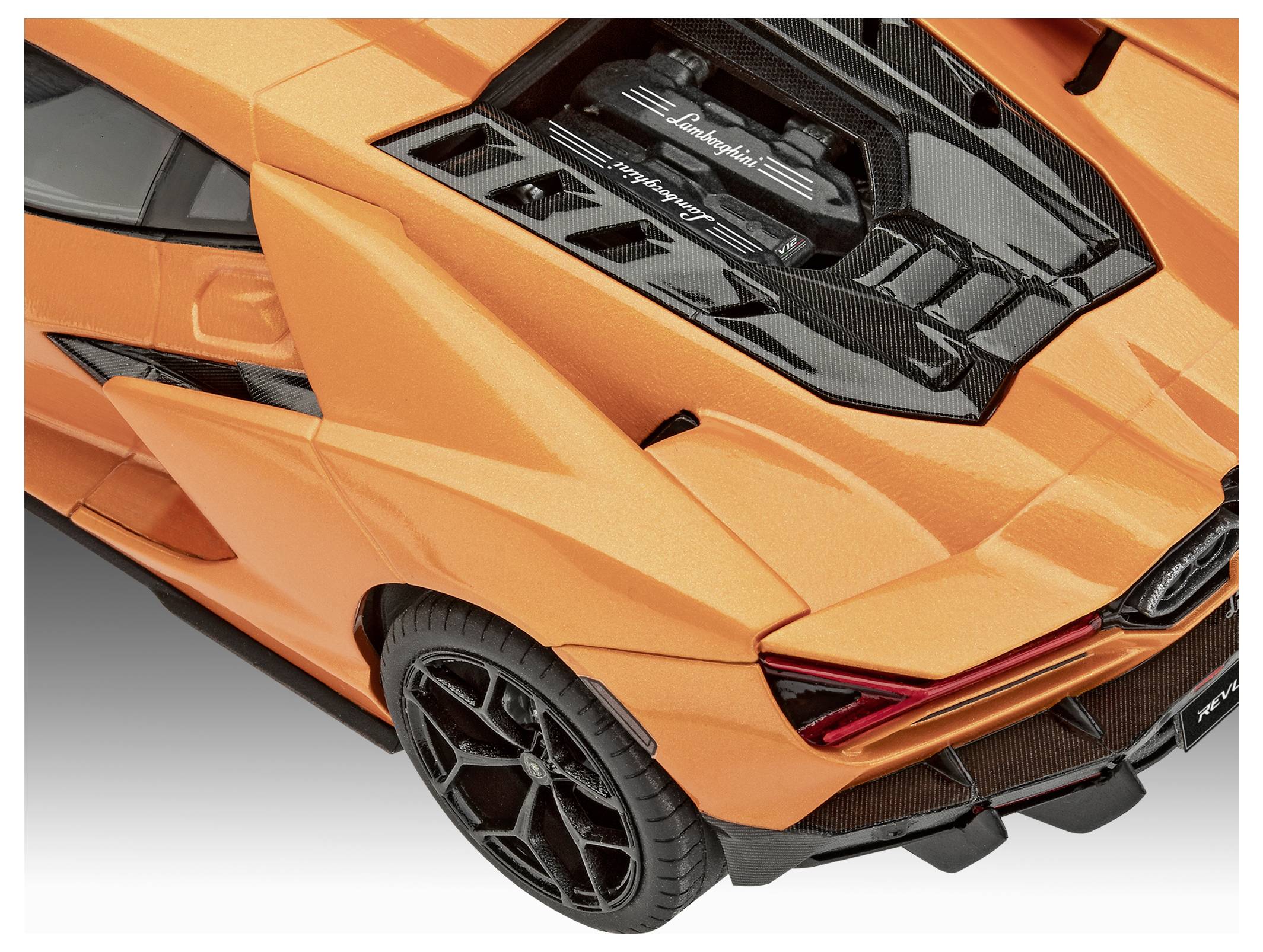 An orange sports car with visible engine details, showcasing a sleek design and black accents on the rear.
