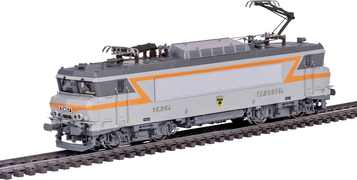 A model train with a gray and orange design is on a track. It features detailed pantographs and markings, including the word 'En Voyage'.