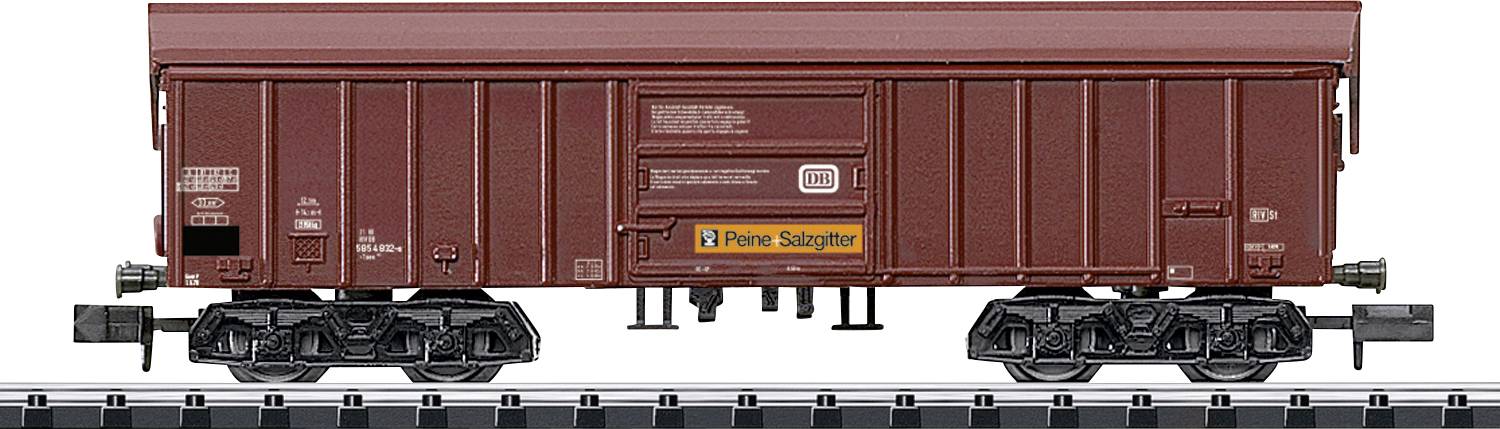A brown freight train car with dark wheels, labeled 'Pere Subyrat', sits on a track, showcasing detailed construction and logos.