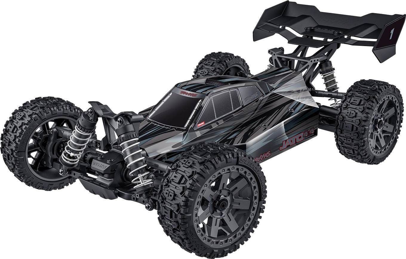 A black and gray remote-controlled car with robust tires, suspension springs, and a rear spoiler, designed for off-road racing.