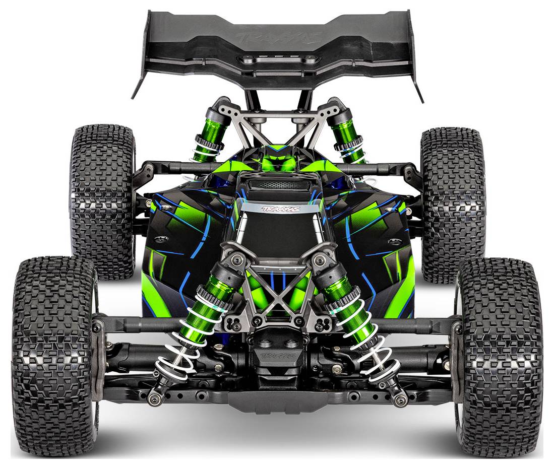Remote control car viewed from the front, showcasing its suspension, tires, and aerodynamic design with a green and black color scheme.
