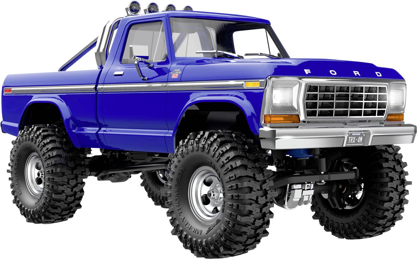 A blue, vintage Ford truck with large off-road tires and a roll bar is shown at an angle, showcasing its rugged design.