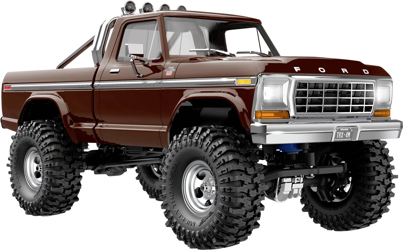 A customized vintage pickup truck with large off-road tires, lifted suspension, and a dark red exterior. It features a classic design.