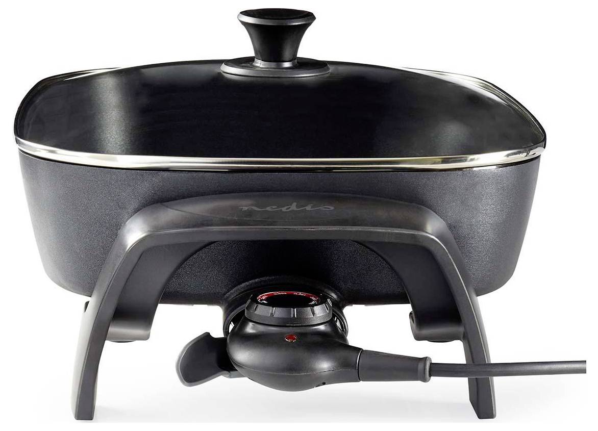 A black electric skillet on a stand with a lid and temperature control dial.