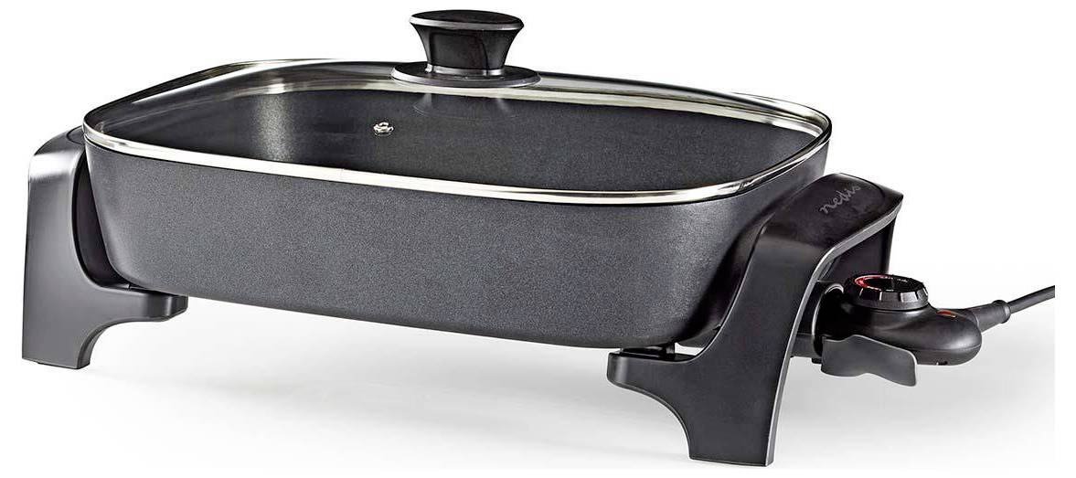 Black electric skillet with glass lid, temperature control dial on the side, and sturdy base for stability.