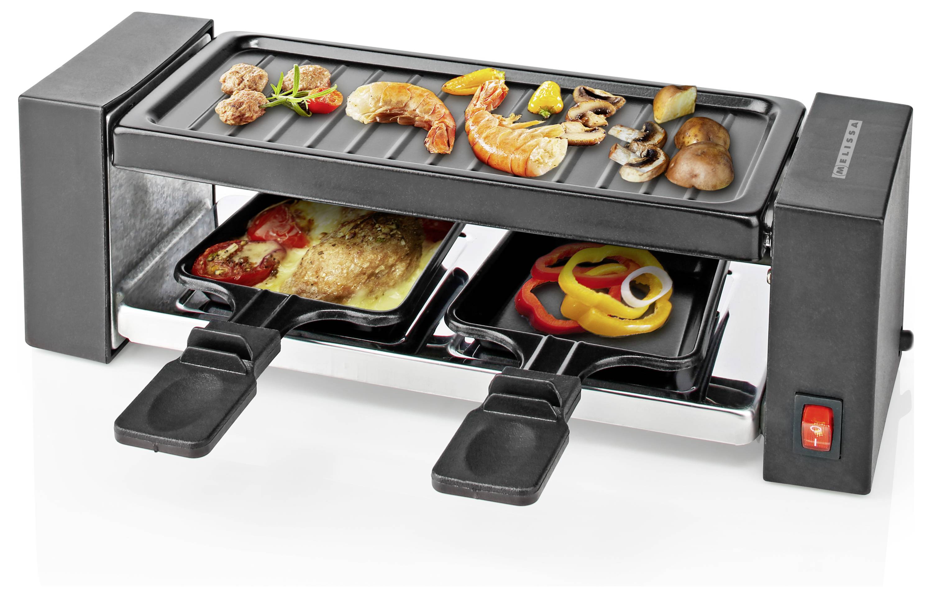Electric raclette grill with meat, shrimp, vegetables on top; cheese and bell peppers melting on trays below. Black with red switch.