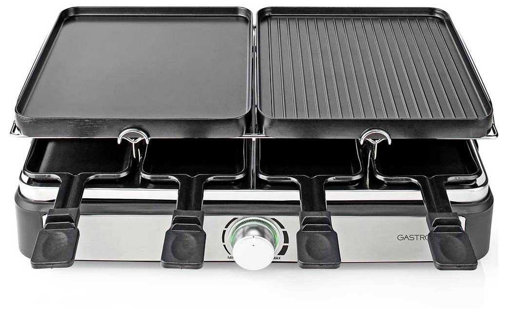 Dual-purpose electric grill with flat and ridged plates on top, five black fondue forks and holder beneath, surrounded by a silver base.