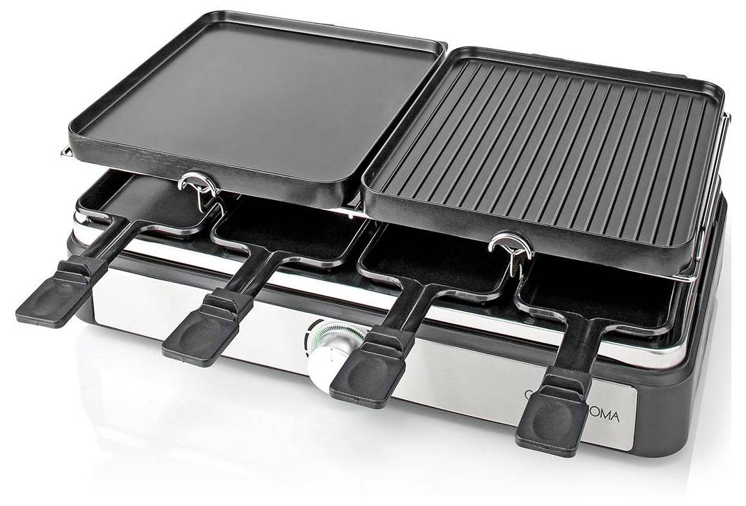 A dual-surface tabletop grill with a flat griddle on the left and a ridged grill on the right, featuring four slots with raclette trays.