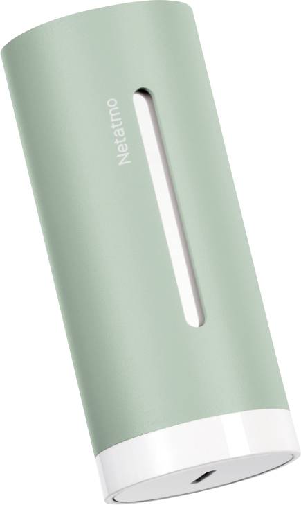 A sleek, cylindrical green device with 'Netatmo' written on the side, featuring a vertical slit design and white base, likely a smart home gadget.