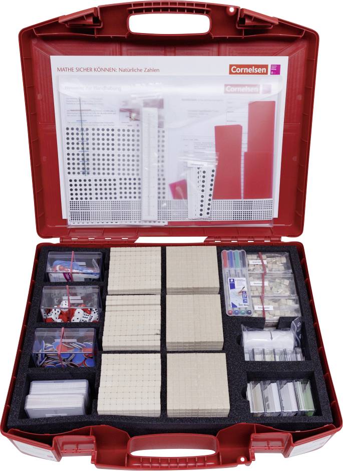 Red educational kit box open to reveal math teaching materials including blocks, cards, dice, and instructional manuals organized neatly.