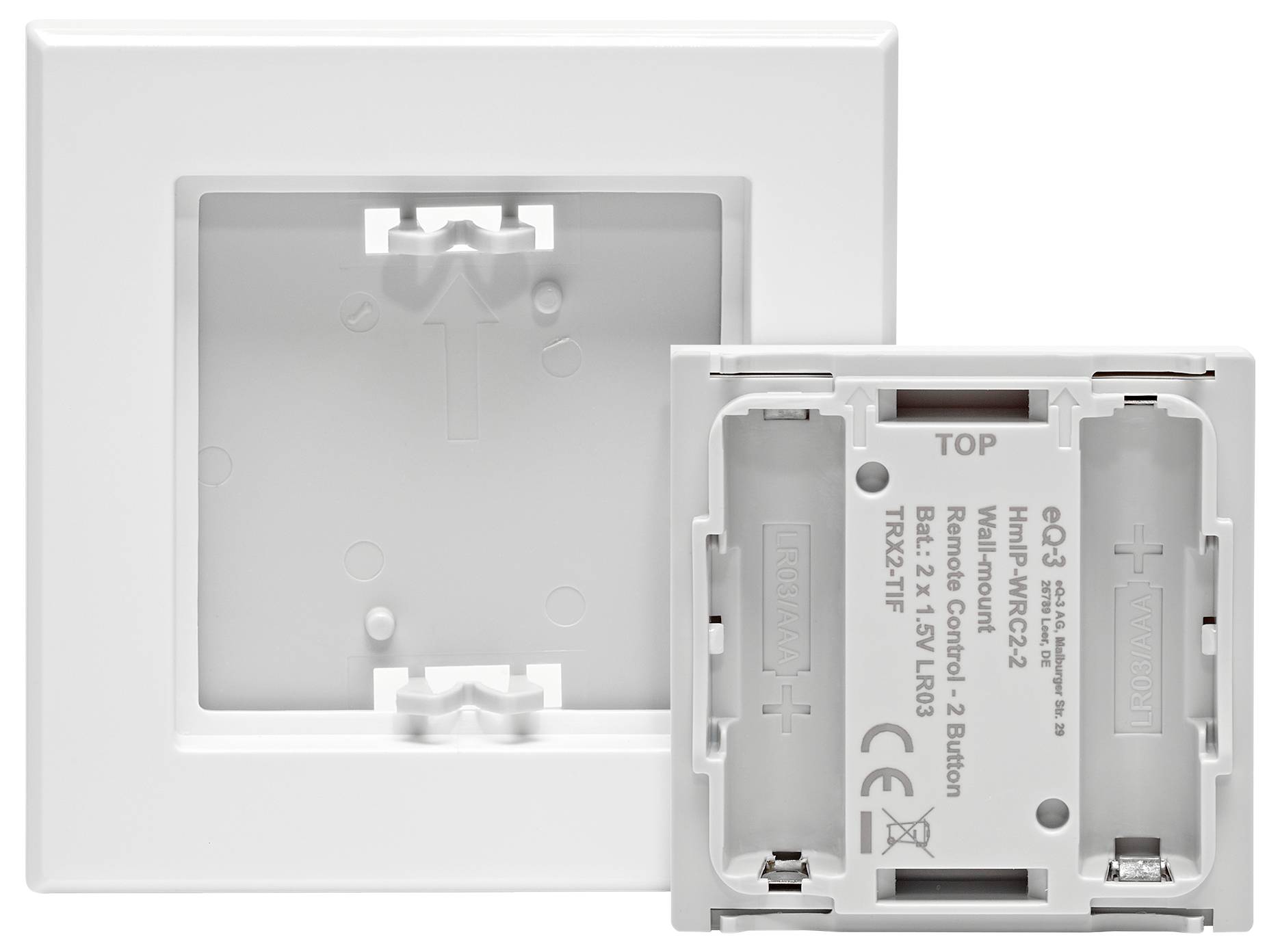 Two parts of a wall switch, including a square frame and a detachable back panel with battery compartments and model information.