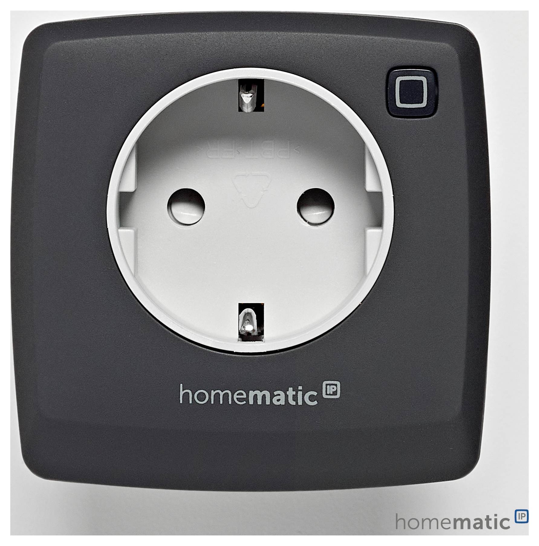 'A Homematic IP smart plug' featuring a white socket and a black square design.