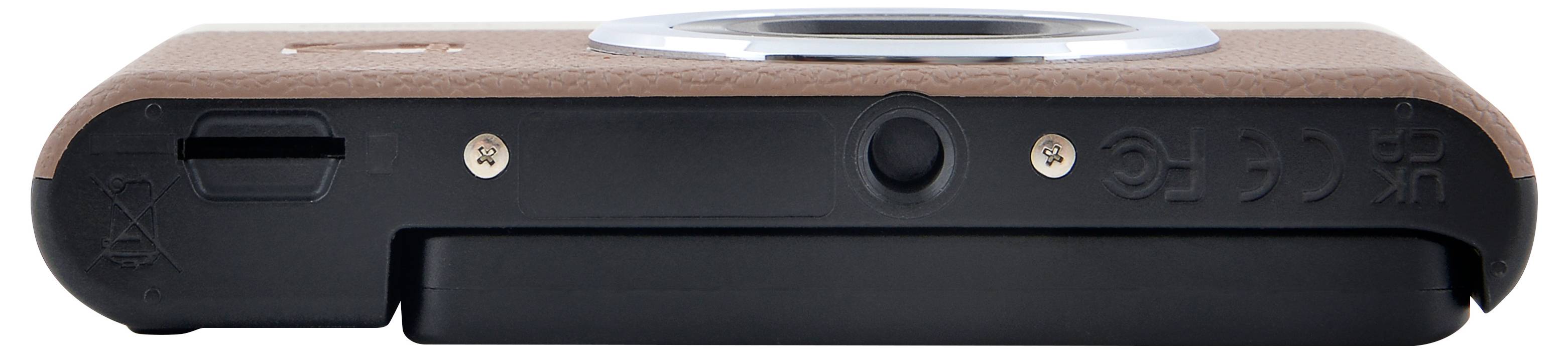 The image shows the bottom view of a compact brown and black camera with a round lens and battery compartment.