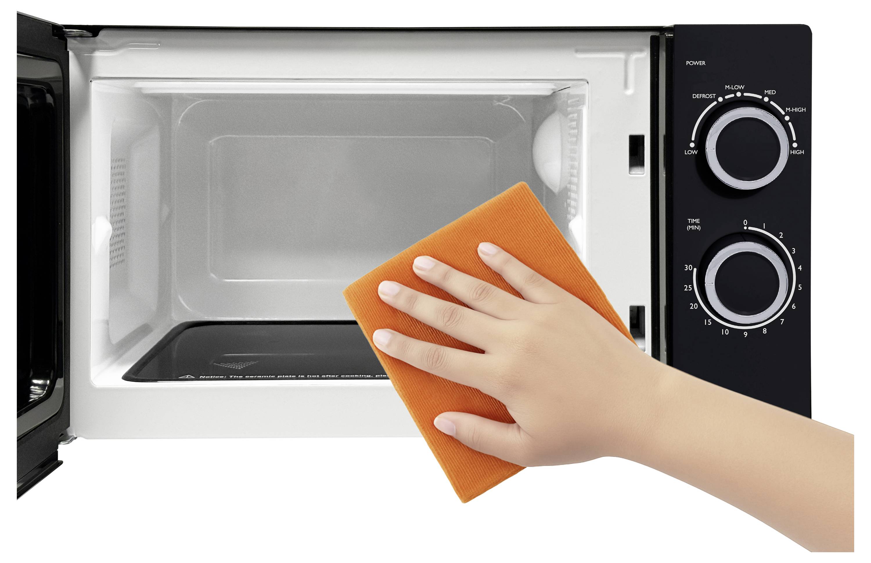 A hand is shown cleaning the interior of a microwave oven with an orange cloth, focusing on hygiene and appliance maintenance.