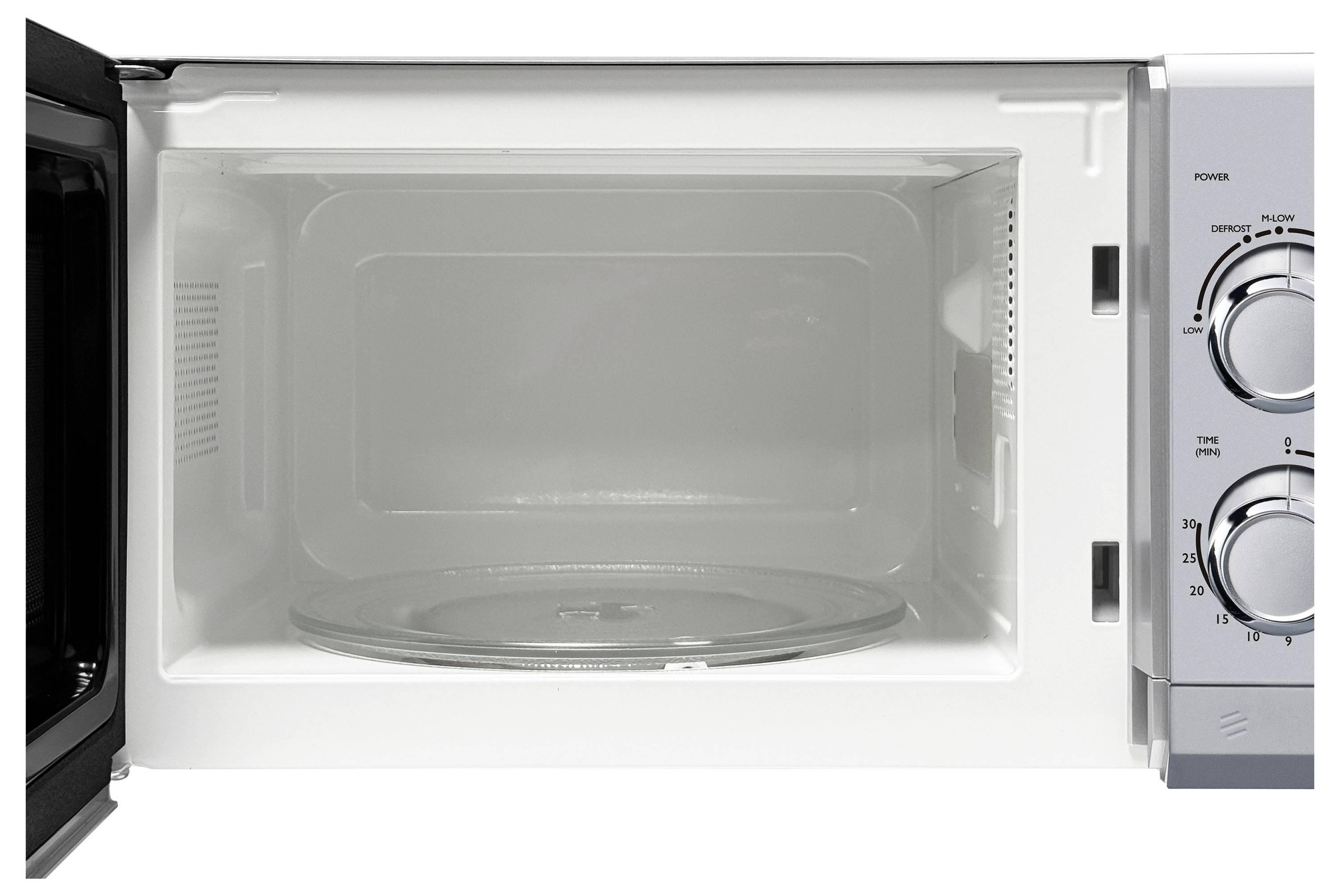 The image shows the open interior of a microwave oven with control dials on the right side for power and timing settings.