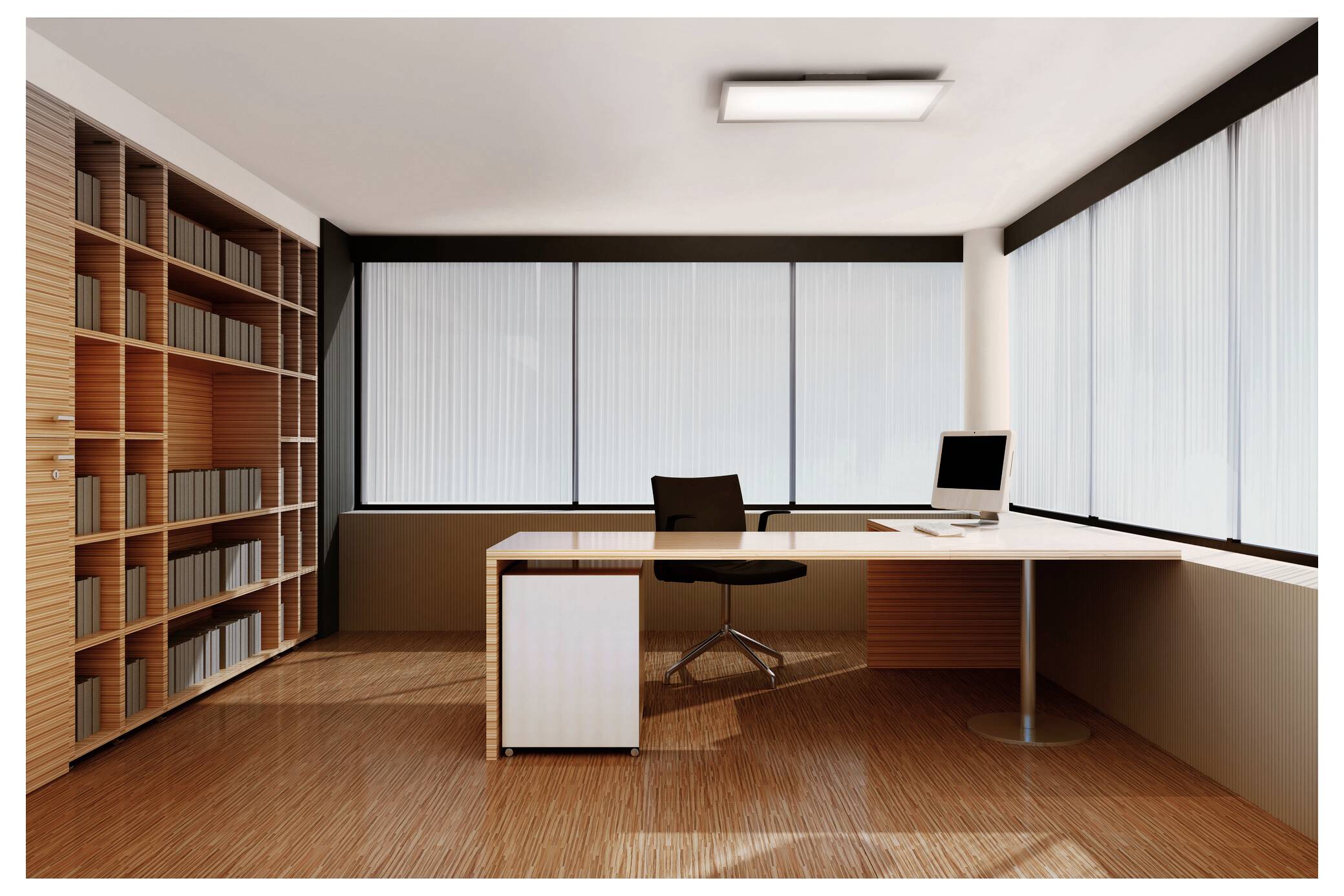 A modern office with a minimalist desk, chair, computer, large windows, and a wall of shelves filled with books.