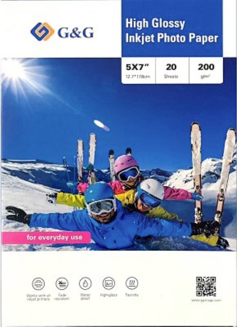 A group of four skiers pose playfully on a snowy slope under bright sunlight. Text reads 'High Glossy Inkjet Photo Paper, 5x7