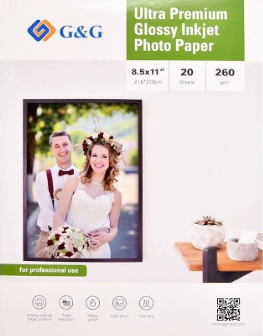 A package for 'Ultra Premium Glossy Inkjet Photo Paper' is shown. It includes a photo of a smiling couple and details about paper size and weight.