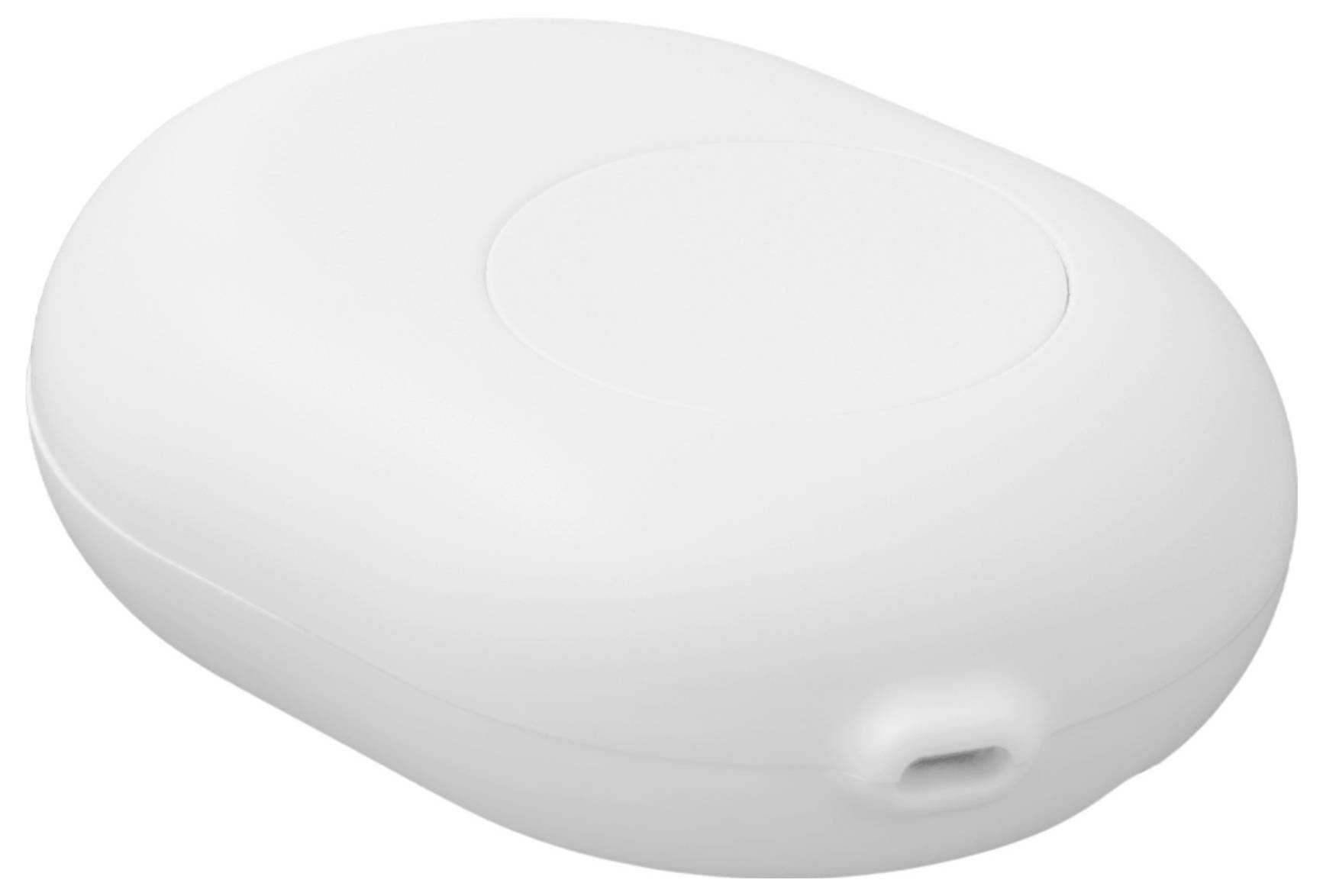 A white, oval-shaped, portable device with a USB port on the side for charging, likely a wireless charger or power bank.
