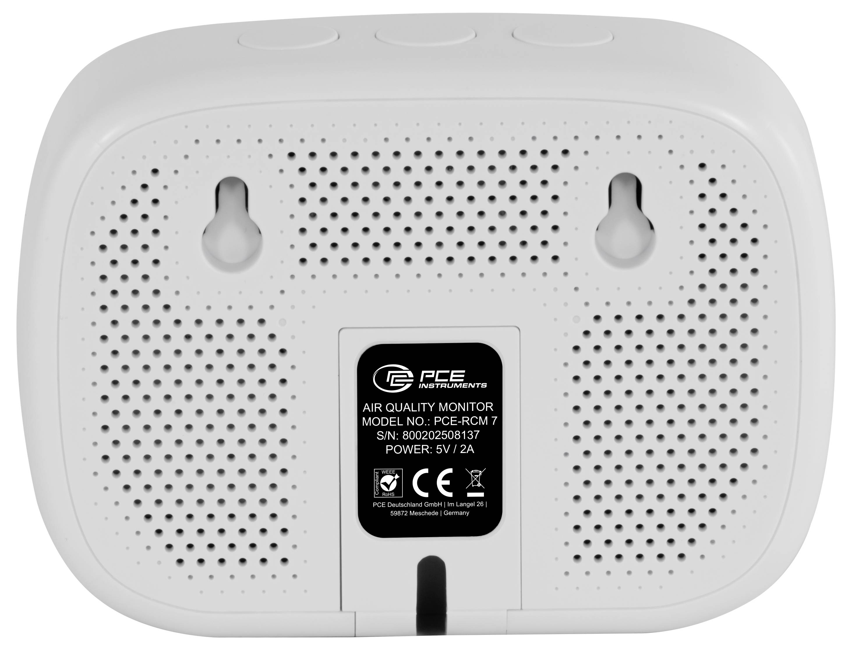 Back of a white PCE air quality monitor with perforated vents, wall-mount slots, and product label in the center.