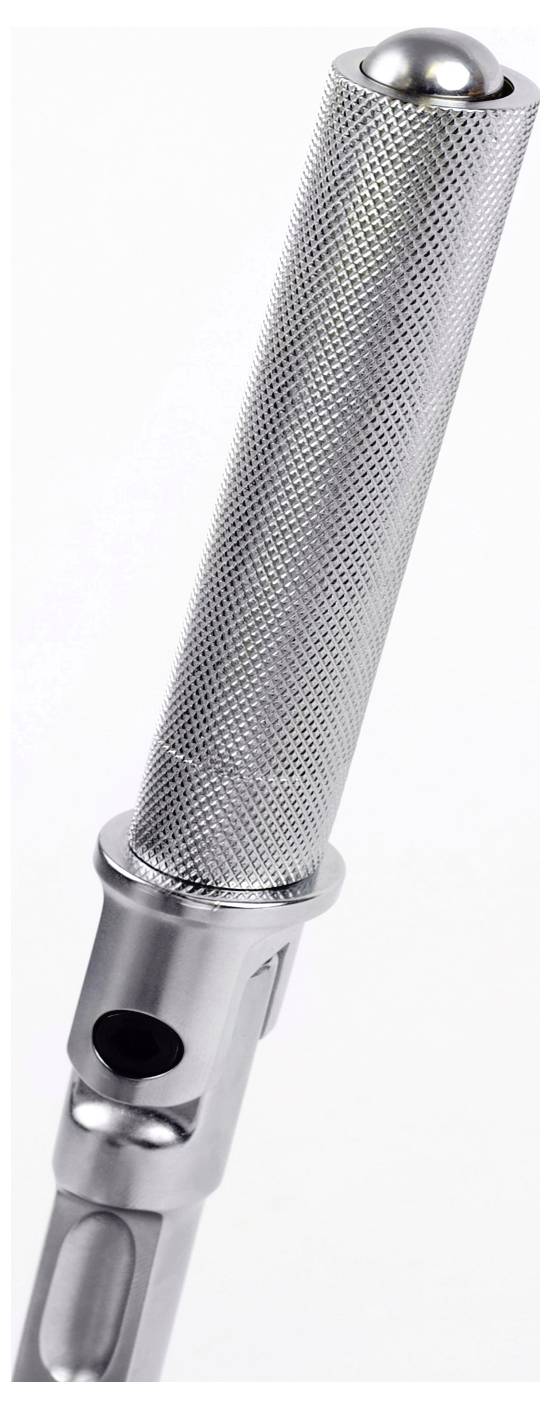 A metal tool with a textured grip handle and a spherical tip, likely for precise manual applications or adjustments.