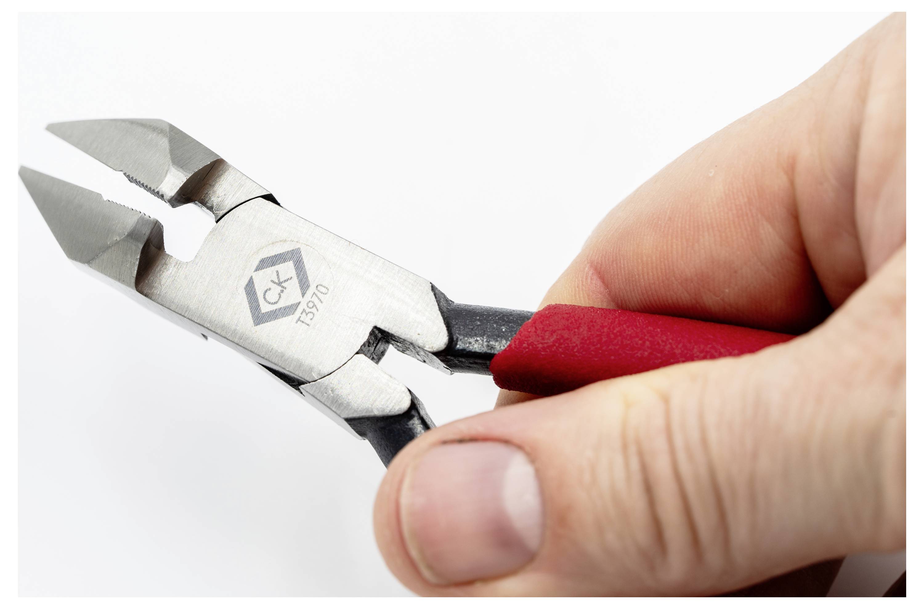 A hand holding a pair of silver and red wire cutters, displaying the logo 'CK TS70' on the tool.