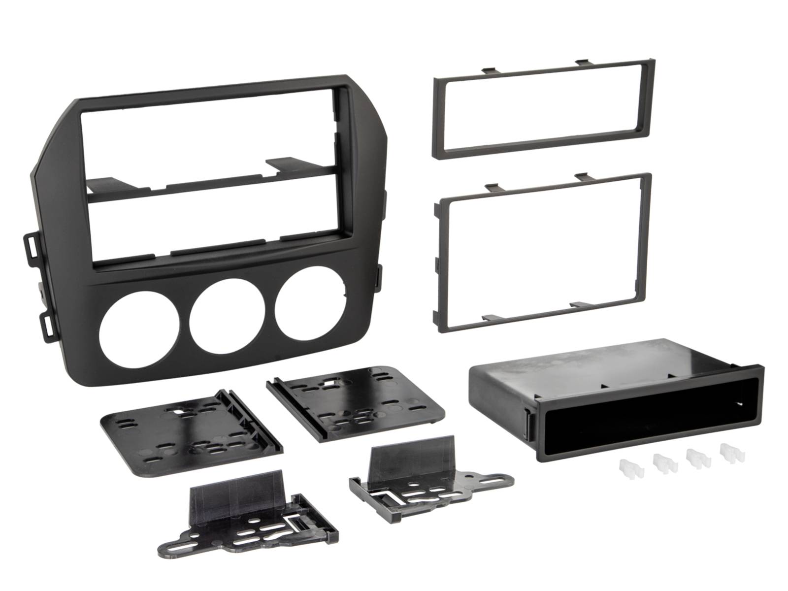 Disassembled black car stereo dash kit with mounting frames, three circular gauge openings, plates, brackets, and a single-DIN radio sleeve.